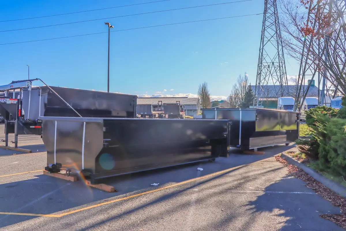 Roll-off dumpster ready for waste disposal at job site for Construction Dumpster Rental in Mableton